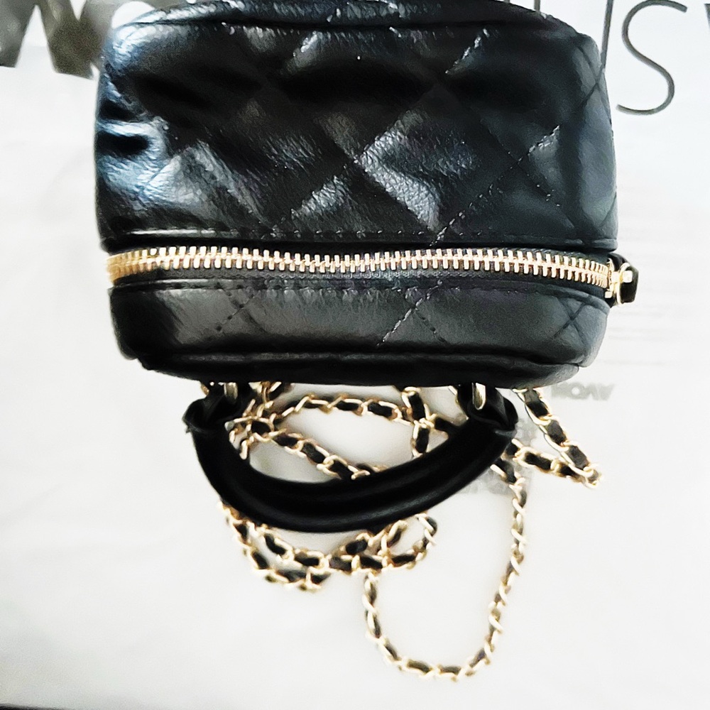 Fashion Nova sexy little go to bag on black and gold,New with tags